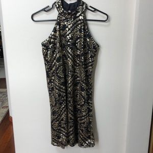 Black and gold sequin dress